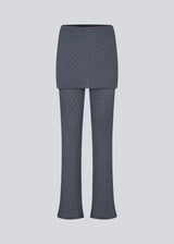 Long flared pants with a skirt. MynteMD pants is made in an elastic and structured material and has an elastic in the waist.