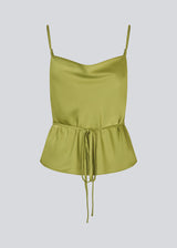 Loose top with thin adjustable straps in satin. NarcissaMD strap top has a thin tieband in the waist and a waterfall detail at front.