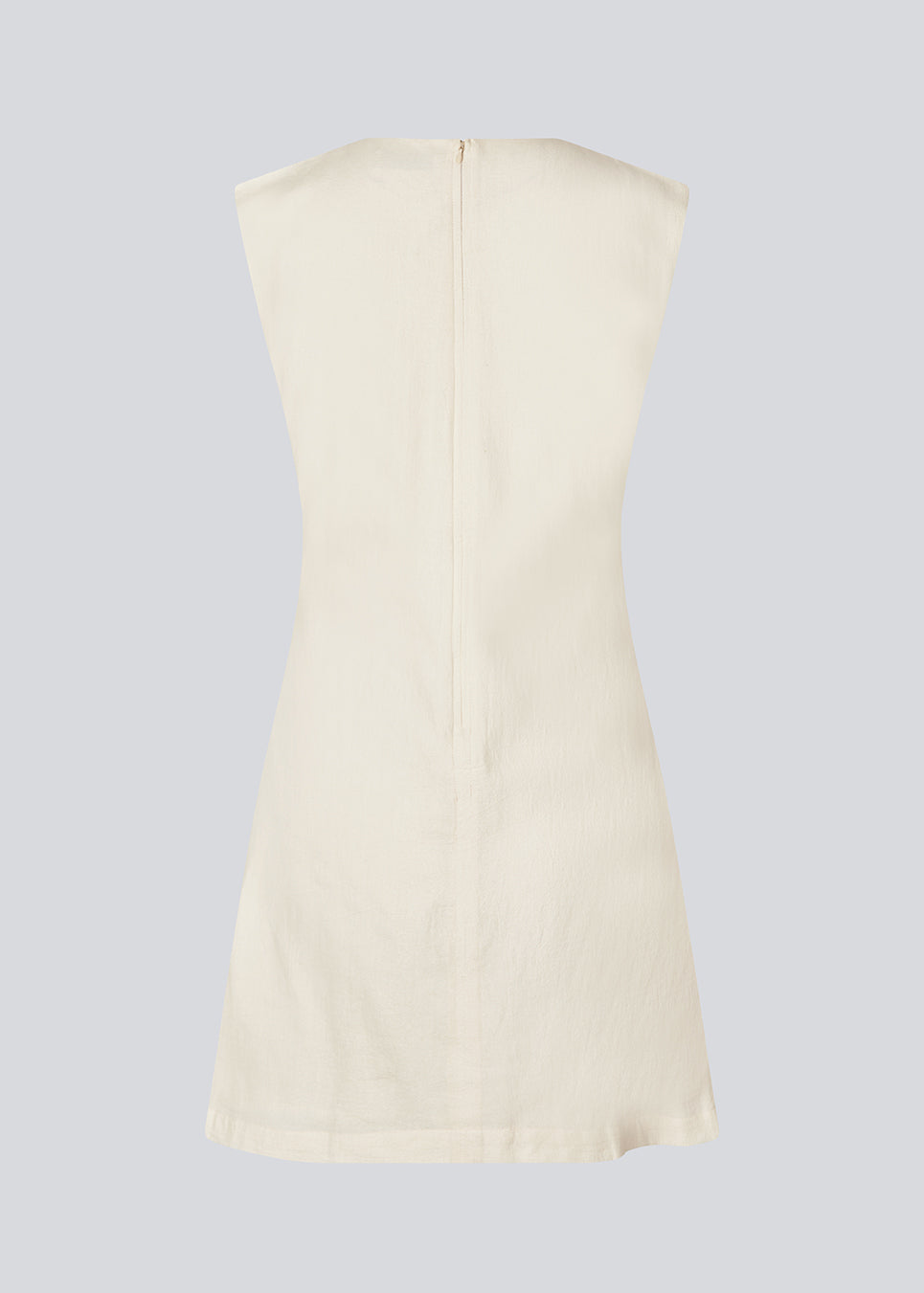 Sleeveless white denim dress in cotton. NadirMD dress is fitted, has a round neck and a zipper in the back.