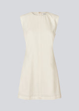 Sleeveless white denim dress in cotton. NadirMD dress is fitted, has a round neck and a zipper in the back.