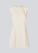 Sleeveless white denim dress in cotton. NadirMD dress is fitted, has a round neck and a zipper in the back.