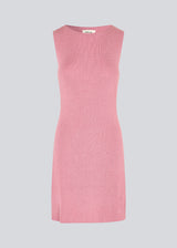 Short pink fitted dress in shimmery knit. NavalMD dress is sleeveless and has a round neckline.