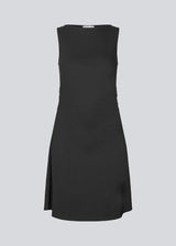 Short sleeveless dress in ribbed jersey. NemiMD dress has a round neckline and elastic gatherings in the sideseam.