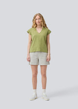 Short-sleeved t-shirt in green made of 100% organic cotton. NeomaMD t-shirt has a v-neck and a loose fit.