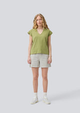 Short-sleeved t-shirt in green made of 100% organic cotton. NeomaMD t-shirt has a v-neck and a loose fit.