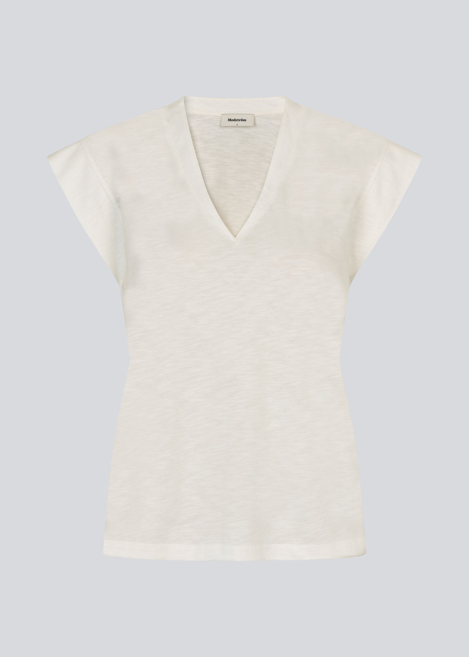 Short-sleeved white t-shirt in 100% organic cotton. NeomaMD t-shirt has a v-neck and a loose fit.