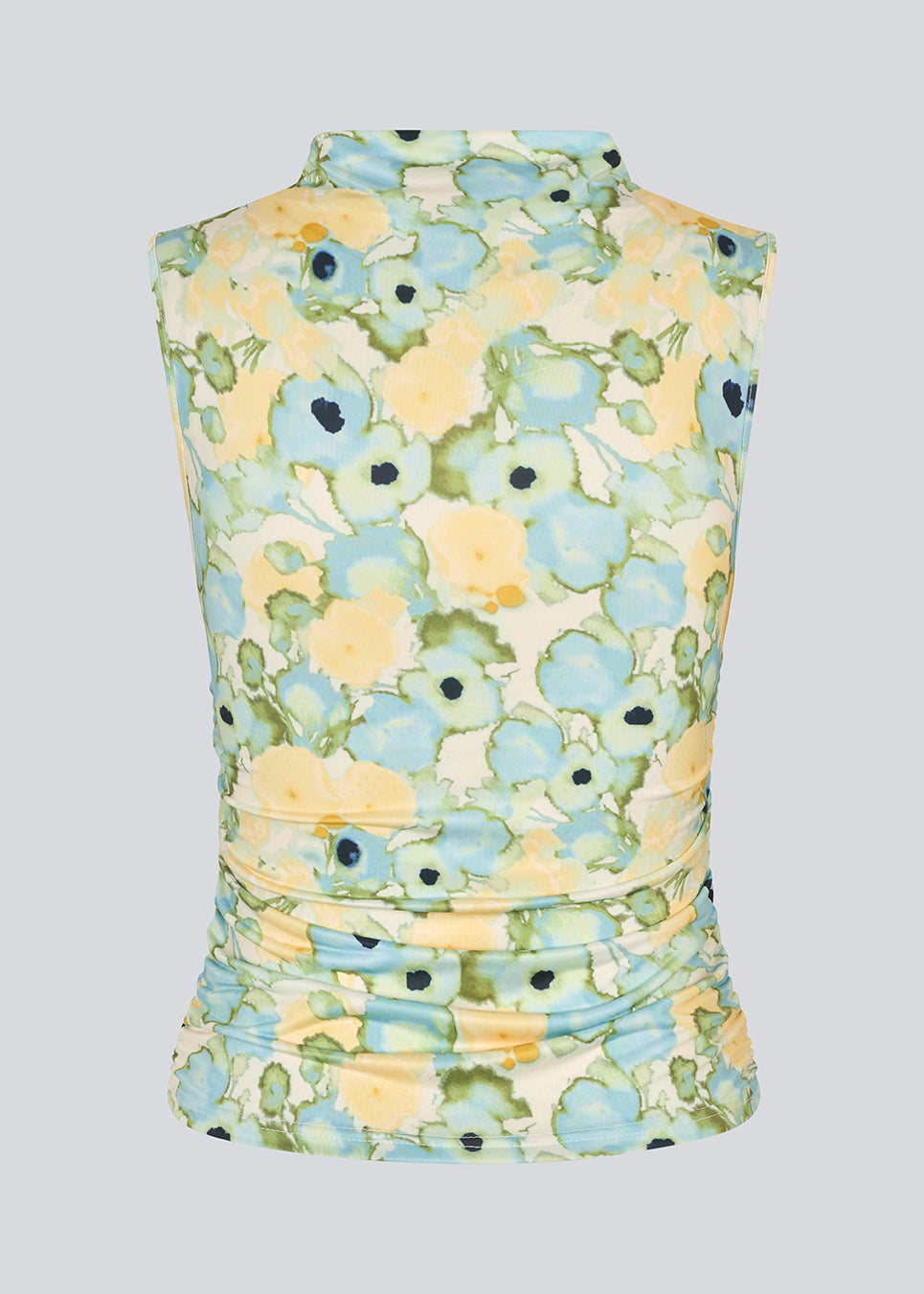fitted top in an elastic material. NettieMD print top is sleeveless, has a high neckline, and has gatherings in the side