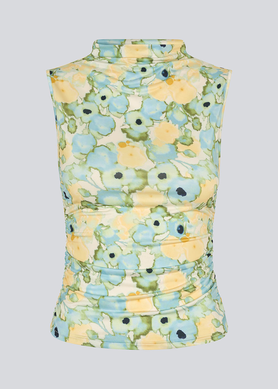 fitted top in an elastic material. NettieMD print top is sleeveless, has a high neckline, and has gatherings in the side