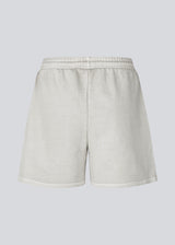 Loose shorts in sweat with a tieband at the waist. NiarnMD shorts have an elastic waistband and side pockets.