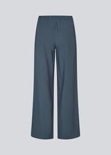 Blue pants with wide legs in EcoVero viscose. NickiMD pants have an elastic waistband and side pockets.