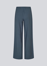 Blue pants with wide legs in EcoVero viscose. NickiMD pants have an elastic waistband and side pockets.