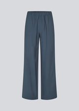 Blue pants with wide legs in EcoVero viscose. NickiMD pants have an elastic waistband and side pockets.