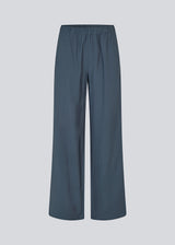 Blue pants with wide legs in EcoVero viscose. NickiMD pants have an elastic waistband and side pockets.