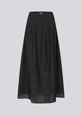 Black maxi skirt in 100% organic cotton. NillaMD long skirt has a loose skirt with pleats and frill details, and an elastic waist with a smock.