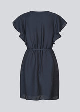 Short-sleeved dress with a tieband at the waist. NixonMD dress has a v-neck and a loose fit.