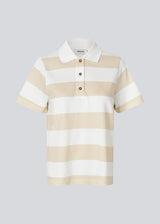 Short-sleeved polo in 100% cotton pique with an embroidered logo. NobuMD LS polo has a placket with 3 buttons.