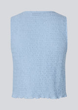 Sleeveless blue top with an opening with a tiedetail in front. NolineMD top is slightly cropped and has a loose fit and v-neck.