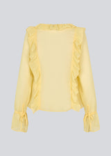 Long-sleeved top with a loose fit and frill details. NorrisMD top has a v-neck and wide sleeves with tie bands.