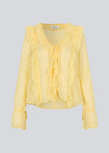 Long-sleeved top with a loose fit and frill details. NorrisMD top has a v-neck and wide sleeves with tie bands.