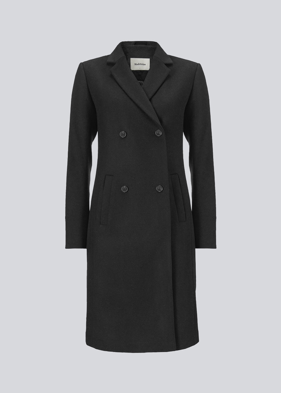 Beautiful, knee-length wool coat in black. Odelia coat is closed at front by 4 buttons and is fitted around the waist, which gives a feminine look. Because of the high content of wool the jacket will be perfect for fall and the mild winters.