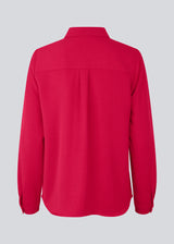 Classic shirt in pink in a loose and relaxed silhouette. Ossa shirt has a small collar, slim cuff and buttons in a matching colour for a sleek design. The model is 173 cm and wears a size S/36