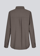 Our classic OssaMD shirt in brown has a loose and relaxed silhouette. Ossa shirt has a small collar, slim cuff and buttons in a matching colour for a sleek design. 