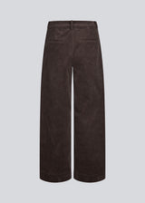 Suit trousers with pleats in corduroy. Pablomd wide pants has long wide legs with side pockets.
