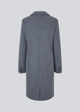 Beautiful, long wool coat. Pamela coat is closed by 3 big buttons at front and is waisted, which gives a feminine look. Because of the high content of wool you will be able to keep warm all through fall and the mild winters. The model is 176 cm and wears a size S/36