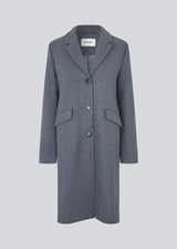 Beautiful, long wool coat. Pamela coat is closed by 3 big buttons at front and is waisted, which gives a feminine look. Because of the high content of wool you will be able to keep warm all through fall and the mild winters. The model is 176 cm and wears a size S/36