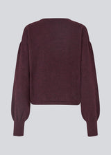 Burgundy/dark red soft knit with loose sleeves. Patrickmd O-neck has a round neckline and ribbed hem. 