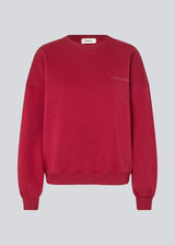 Sweatshirt in dark red with logo made in a cotton mixture. Paulamd sweat has a round neckline and ribbing at the sleeves and bottom. The model is 175 cm and wears a size s/36.