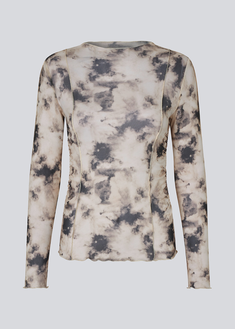 Long-sleeve top in a transparent material. Petrinamd print top is fitted and has a gathering detail at the side. The model is 175 cm and wears a size S/36.