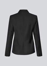 Slightly fitted blazer with a v-neck. Piloumd blazer has two front pockets and a slit at the sleeve with button closure.