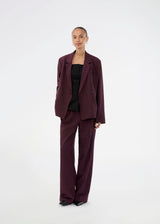 Purple classic blazer with elegant design. The Ripleymd blazer has two front pockets and an asymmetric button closure – a refined and modern take on the classic blazer.