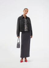 Short denim shirt. The Riyamd shirt features chest pockets and a button closure – a cool and edgy take on the classic denim shirt.