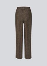 Wool trousers with wide legs. The Rockymd pants have a high waist, front pleats, and side pockets – a structured, classic pants with a timeless feel.
