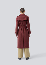 Classic, double-breasted wool coat with collar and notch lapels. ShayMD coat has a wide tiebelt at waist, shoulder straps, wide cuffs and open yoke. With lining and single back vent.