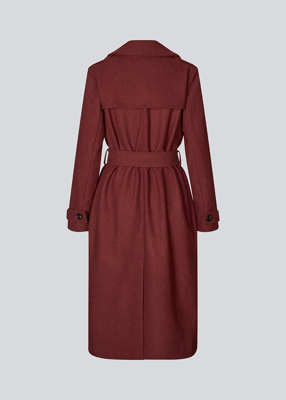Classic, double-breasted wool coat with collar and notch lapels. ShayMD coat has a wide tiebelt at waist, shoulder straps, wide cuffs and open yoke. With lining and single back vent.