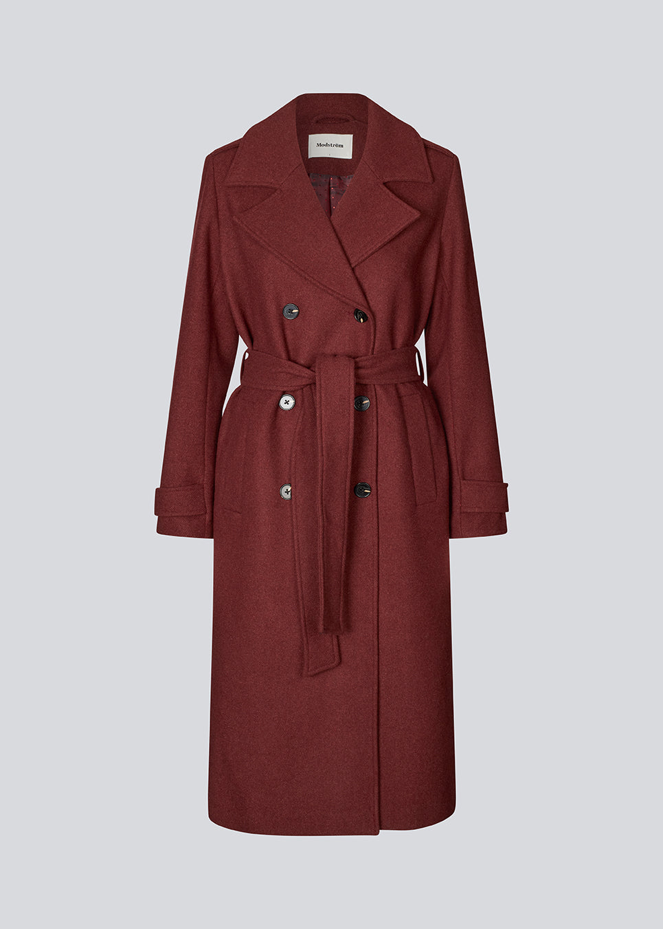 Classic, double-breasted wool coat with collar and notch lapels. ShayMD coat has a wide tiebelt at waist, shoulder straps, wide cuffs and open yoke. With lining and single back vent.
