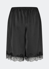 Elegant and lightweight silhouette. TamalMD shorts are designed with a relaxed fit and delicate lace details along the hem, adding a feminine and exclusive touch. Perfect for both comfortable everyday wear and as a stylish element in a modern set.