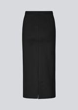 Long pencil skirt in jersey with a figure-hugging fit. TannyMD long skirt has a high waist with covered elastication and a slit at center back.