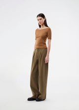 Tansy top has a simple look with a wide neckline at front and back and narrow sleeves. The top is slim fit without being tight.