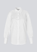 Fitted white shirt with an open back with a tiedetail. Thememd shirt has a shirt collar and a button closure in front. The model is 175 cm and wears a size s/36.
Material:
97% Cotton
3% Elastane
