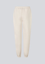 Sweatpants with logo in a cotton mixture. TiaMD pants has sidepockets, tieband and an elastic in the bottom and waist.