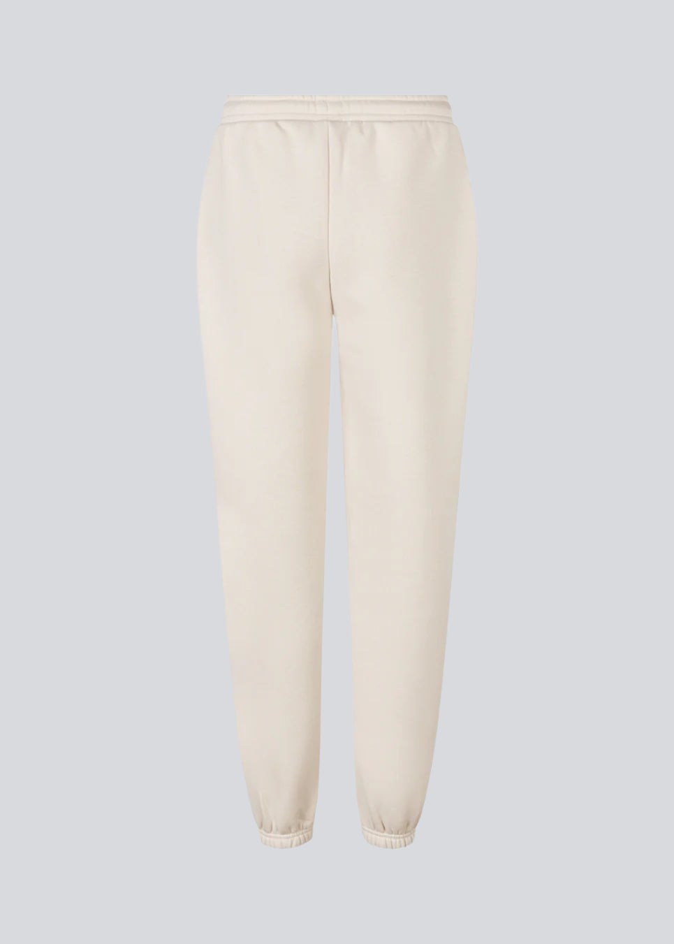 Sweatpants with logo in a cotton mixture. TiaMD pants has sidepockets, tieband and an elastic in the bottom and waist.