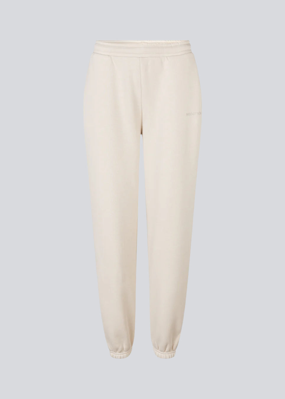 Sweatpants with logo in a cotton mixture. TiaMD pants has sidepockets, tieband and an elastic in the bottom and waist.