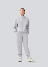 Sweatshirt with logo made in a cotton mixture. TiaMD sweat has a high neck with a zipper and ribbing at the sleeves.