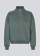 Sweatshirt with logo made in a cotton mixture. TiaMD sweat has a high neck with a zipper and ribbing at the sleeves.