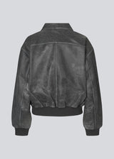 Oversized leather jacket in soft lamb leather. TiggyMD jacket is designed with a bomber look with collar, dropped shoulders og rib trimmings on collar, cuff and hem. Length is slightly cropped.