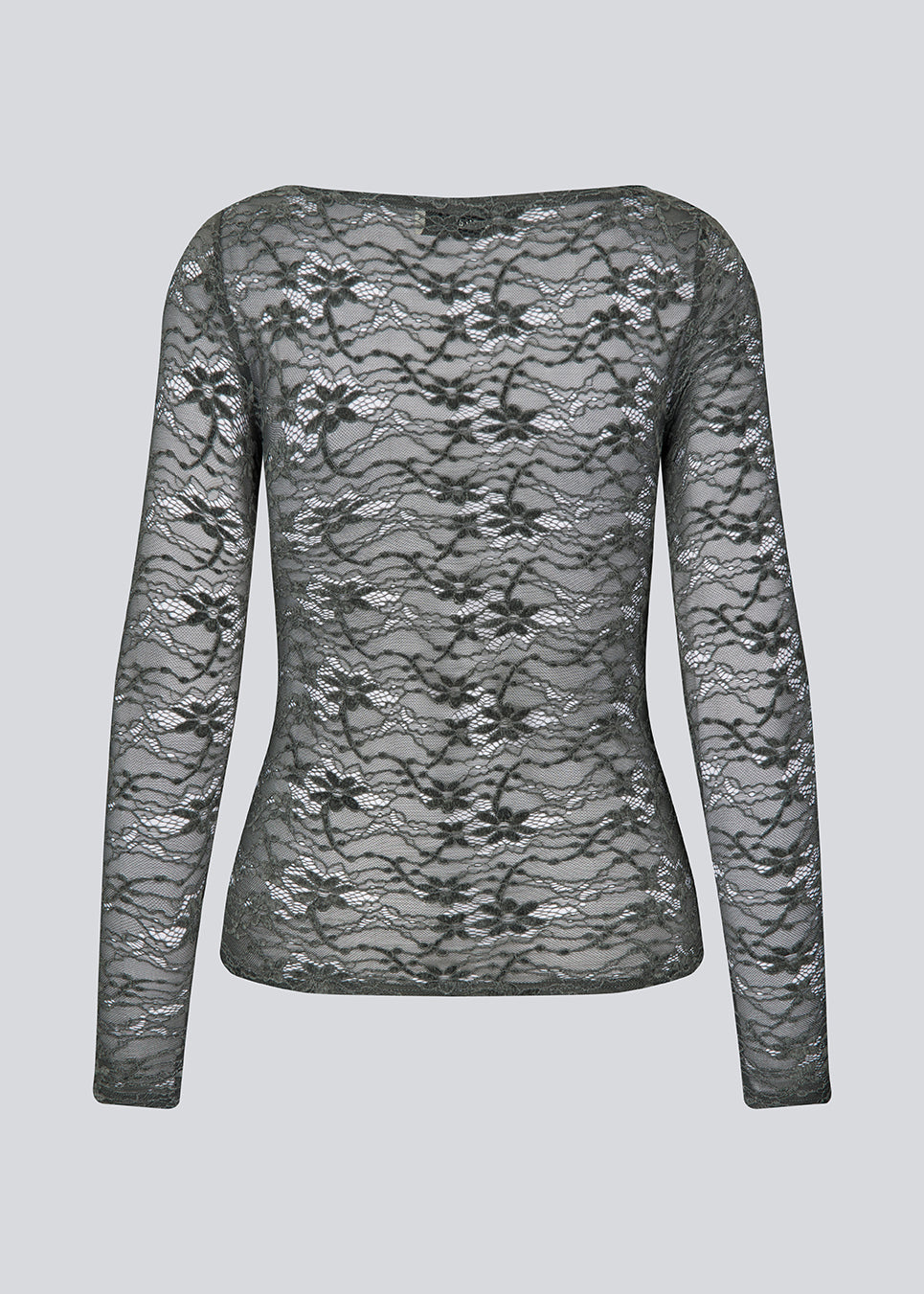 Fitted top in dark green in a see-through lace material. TildeMD top has long sleeves and a wider neckline. 